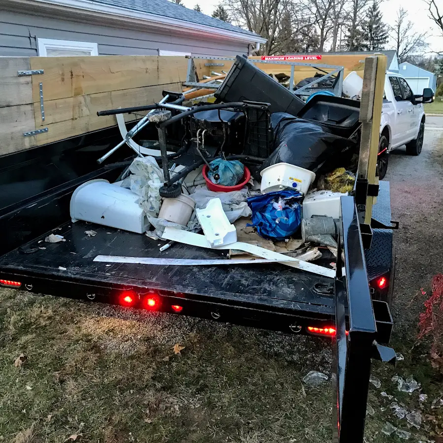Roll-off dumpster delivered to a residential driveway in Red Rock